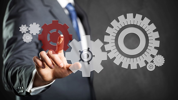 商务人物与齿轮组PPT背景图片